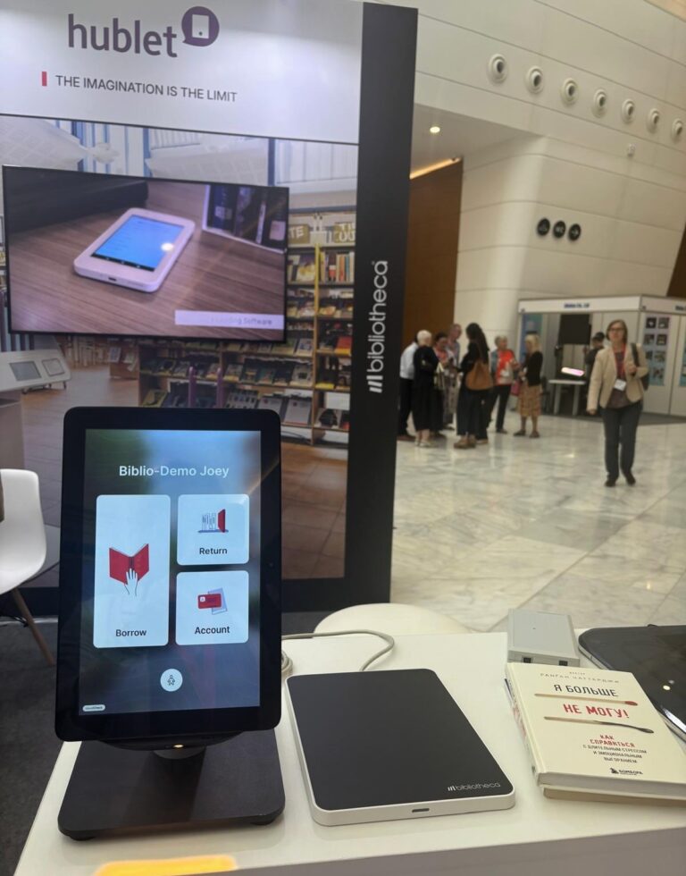 Bibliotheca at IFLA WLIC 2025: Showcasing Library Innovation in Astana 7 A tablet with the Bibliotheca cloudCheck app, showcasing a modern interface for borrowing and returning library materials.