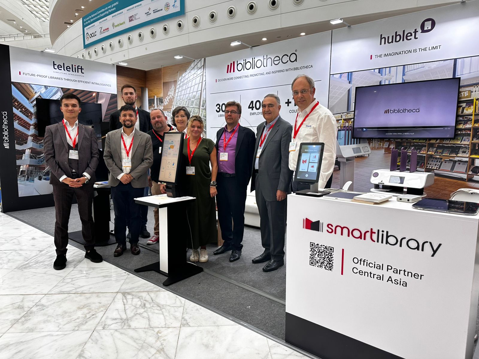Bibliotheca and Hublet expand their partnership to 112 countries 3 Bibliotheca, SmartLibrary, Hublet and Telelift team at IFLA 2025 booth showcasing innovative library solutions in Central Asia.
