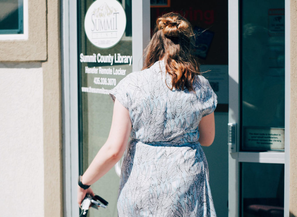 Lady walking into library