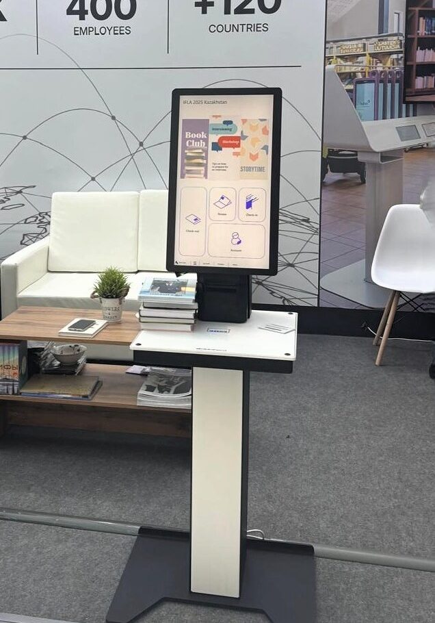 Bibliotheca at IFLA WLIC 2025: Showcasing Library Innovation in Astana 5 Bibliotheca selfCheck 2500 unit at the IFLA 2025 booth, showing a user-friendly interface for library patrons.