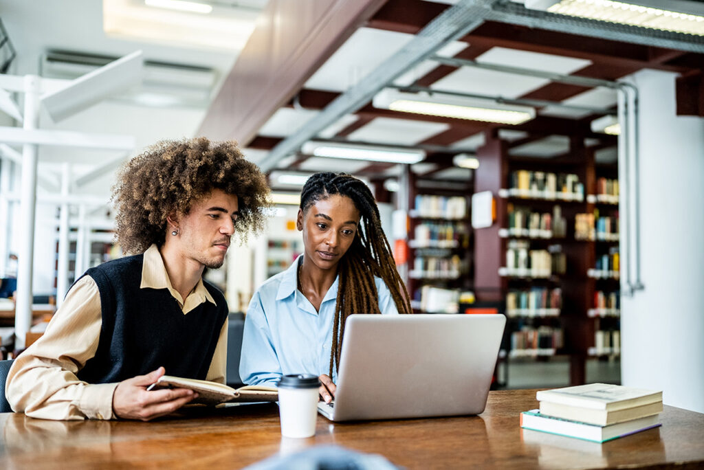 A man and a woman participating in a Bibliotheca webinar