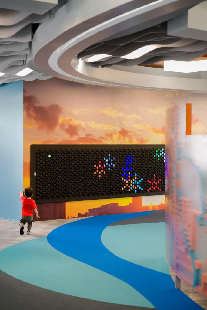 Children's reading nooks with floral mural at Redford Township District Library.