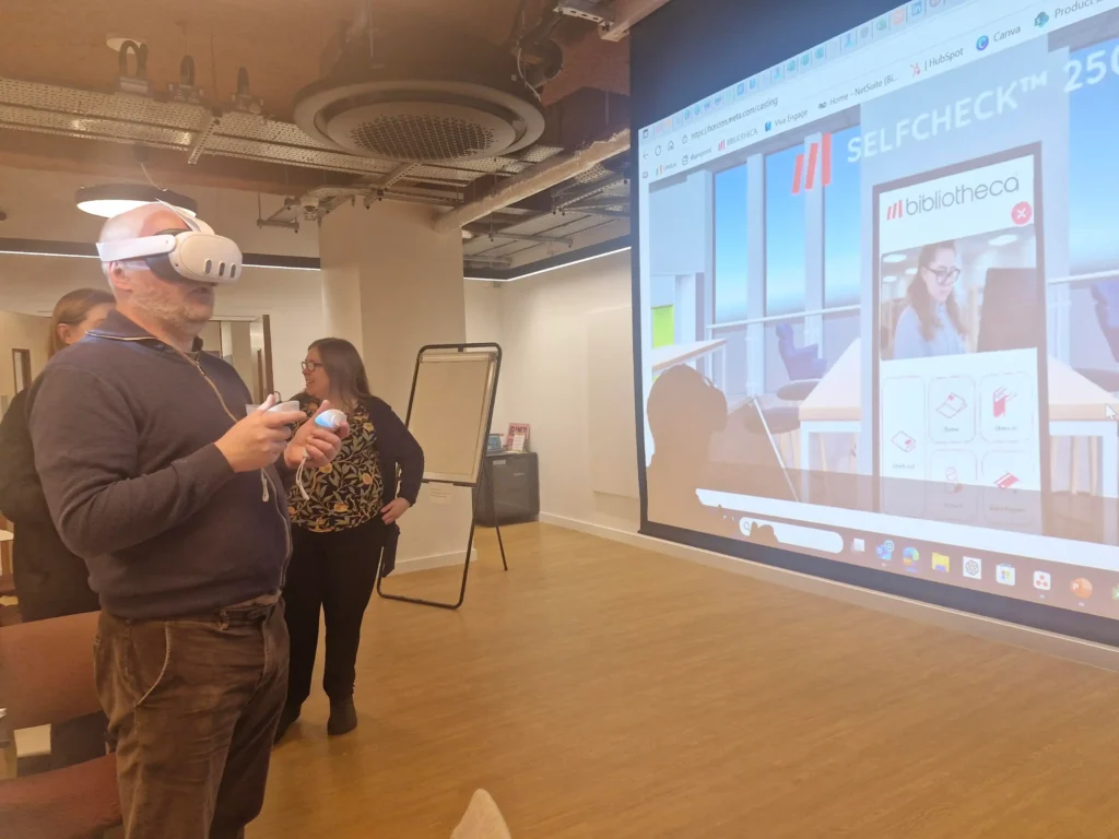 North Roadshow Success: Inspiring Libraries, Sparking Ideas, and Showcasing Innovation 3 Library professionals experiencing the Bibliotheca VR Tour during the North Roadshow at The Stockroom.
